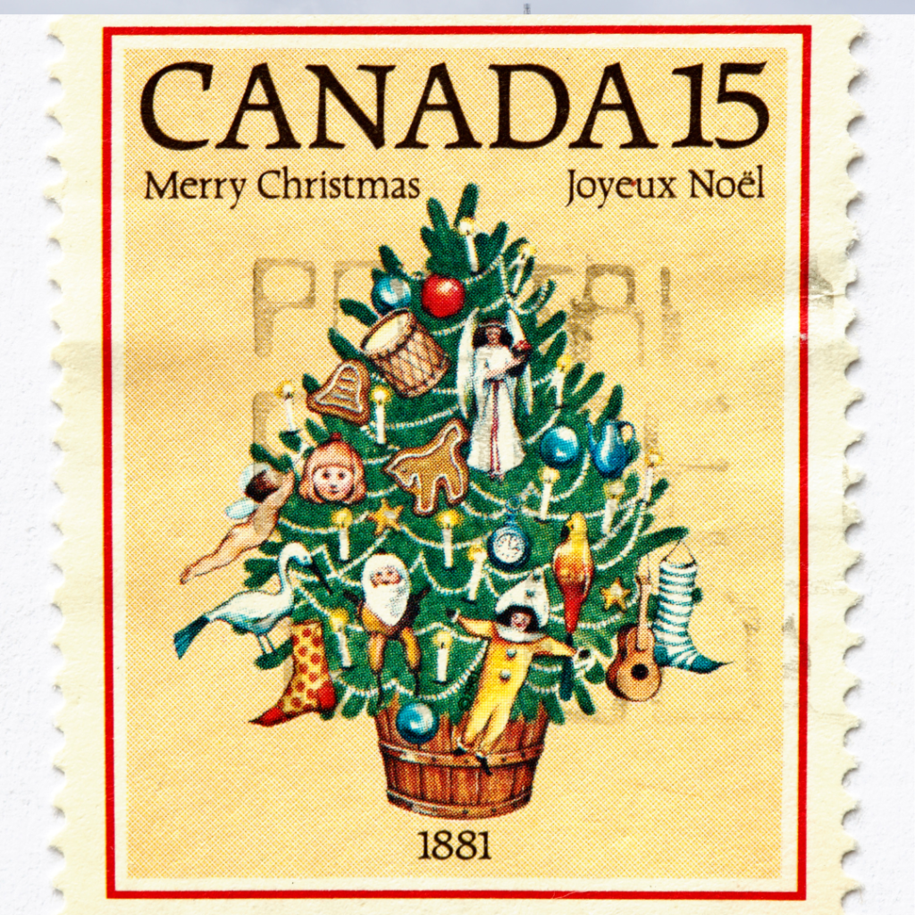 kanadyjski znaczek pocztowy, żółty, w centrum choinka, napisy "wesołych świąt" w językach angielskim i francuskim
